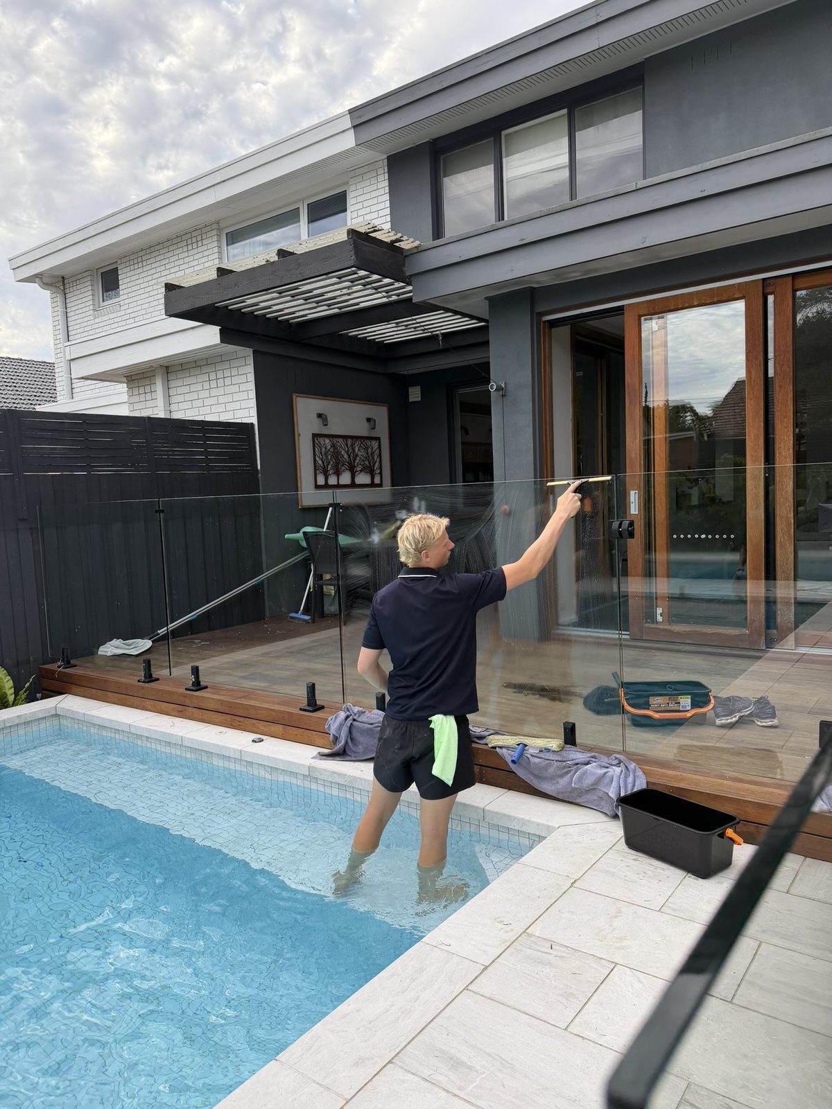 Will squeegeeing a glass pool-fence door at a Melbourne home